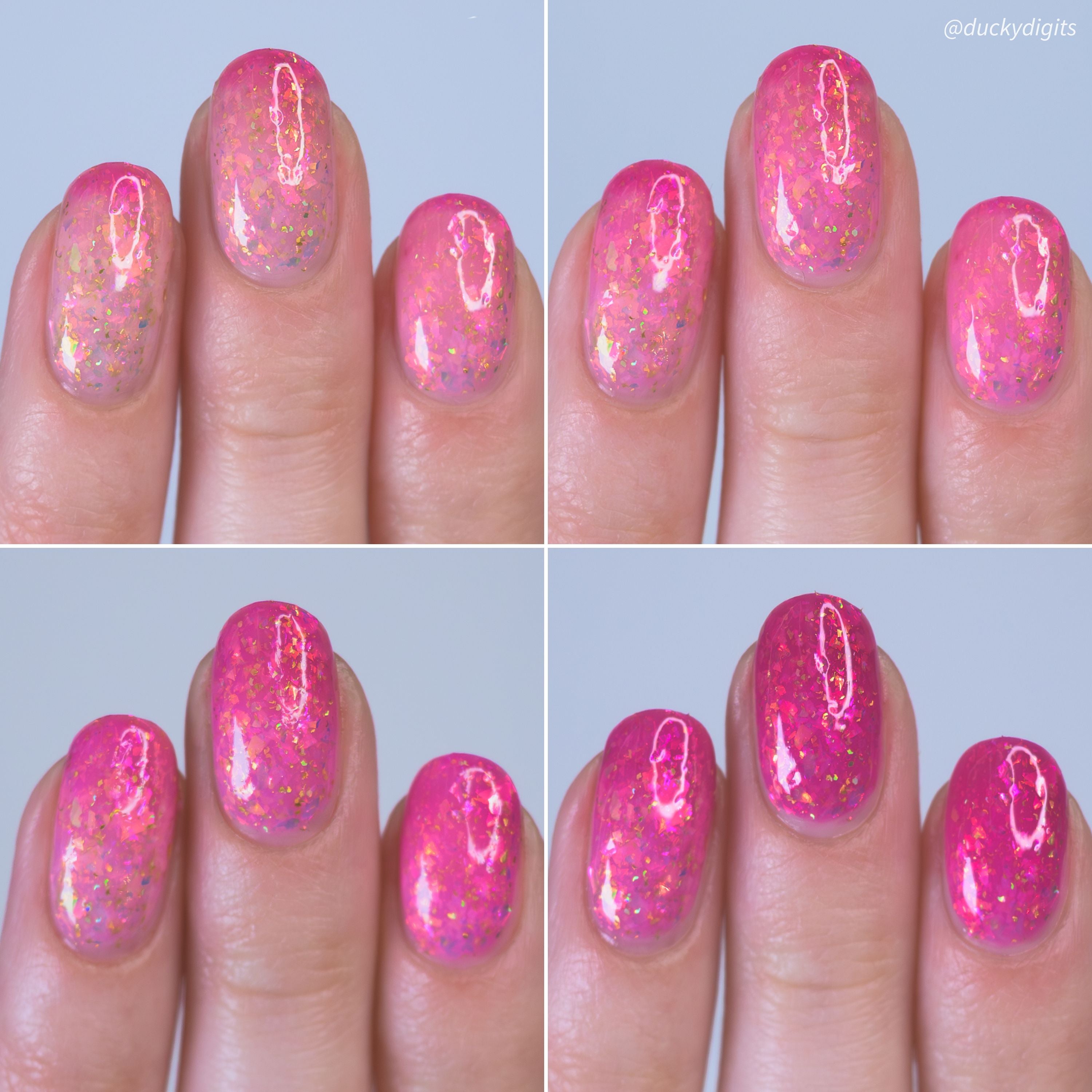 Close-up of a hand with pink thermal nail polish on a light blue background